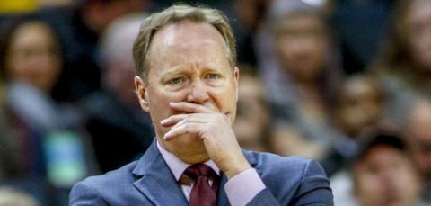 Milwaukee Bucks head coach Mike Budenholzer watches his team play the Charlotte Hornets in the first half of an NBA basketball game in Charlotte, N.C., Monday, Nov. 26, 2018. Charlotte won 110-107. (AP Photo/Nell Redmond)