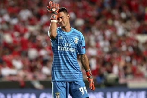 Benfica goalkeeper Odisseas Vlachodimos is dejected after the final whistle of the Champions League playoffs, first leg, soccer match between Benfica and PAOK at the Luz stadium in Lisbon, Tuesday, Aug. 21, 2018. (AP Photo/Armando Franca)