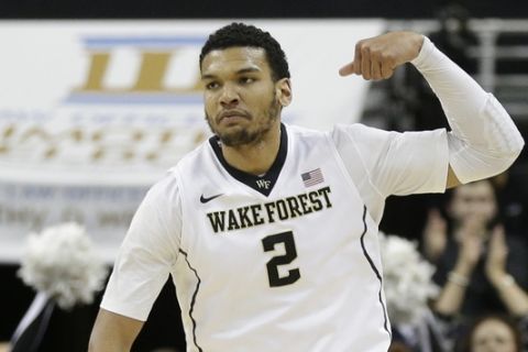 Wake Forest's Devin Thomas (2) reacts after a basket against North Carolina State in the second half of an NCAA college basketball game in Winston-Salem, N.C., Sunday, Jan. 10, 2016. Wake Forest won 77-74. (AP Photo/Chuck Burton)