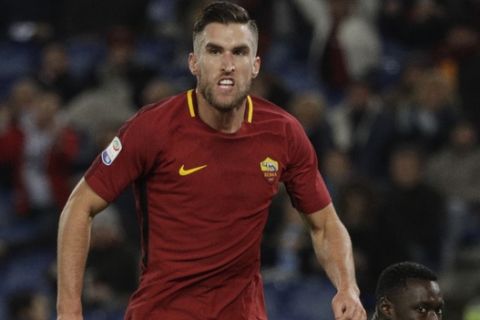Roma's Kevin Strootman reacts after scoring his side's second goal during an Italian Serie A soccer match between AS Roma and Spal, at the Olympic stadium in Rome, Friday, Dec. 1st, 2017. (AP Photo/Gregorio Borgia)