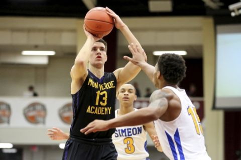 Montverde Academy's Filip Petrusev #13 in action against Simeon Career Academy during a high school basketball game at the Hoophall Classic, Saturday, January 13, 2018, in Springfield,MA. Montverde won the game. (AP Photo/Gregory Payan)