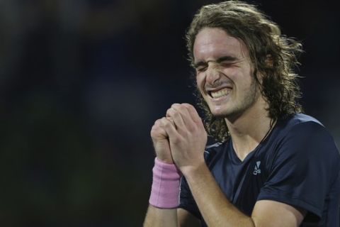 Stefanos Tsitsipas of Greece celebrates after he defeated Gael Monfils of France in their semi final match at the Dubai Duty Free Tennis Championship, in Dubai, United Arab Emirates, Friday, March 1, 2019. (AP Photo/Kamran Jebreili)