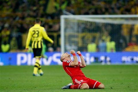 Bayern Munich's Arjen Robben of the Netherlands reacts after the final whistle and his team winning 2-1 the Champions League Final soccer match against Borussia Dortmund at Wembley Stadium in London, Saturday May 25, 2013.  (AP Photo/Matt Dunham)