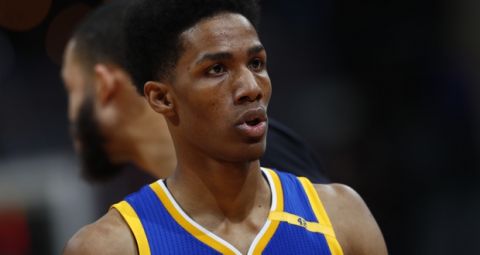 Golden State Warriors guard Patrick McCaw (0) in the second half of an NBA basketball game Monday, Feb. 13, 201, in Denver. The Nuggets won 132-110. (AP Photo/David Zalubowski)