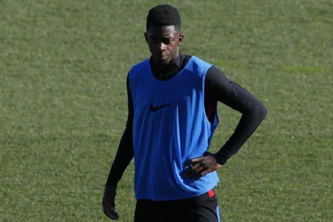 FC Barcelona's Ousmane Dembele takes part in a training session at the Miniestadi stadium in Barcelona, Spain, Friday, Jan. 5, 2018. FC Barcelona will play against Levante in a Spanish La Liga soccer match on Sunday. (AP Photo/Manu Fernandez)