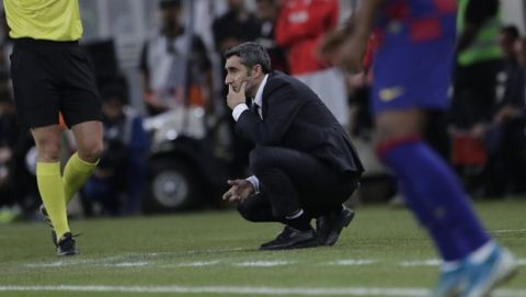 Barcelona's head coach Ernesto Valverde reacts during the Spanish Super Cup semifinal soccer match between Barcelona and Atletico Madrid at King Abdullah stadium in Jiddah, Saudi Arabia, Friday, Jan. 10, 2020. (AP Photo/Amr Nabil)