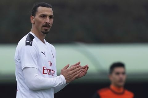 AC Milan's Zlatlan Ibrahimovic claps his hands during a friendly soccer match between AC Milan and Rhodense, in Carnago, Italy, Friday, Jan. 3, 2020. The 38-year-old striker has been presented by AC Milan after signing a deal until the end of the season with an option to extend for another year. (Sapda/LaPresse via AP)