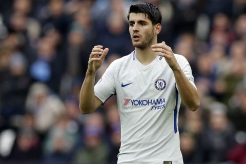 Chelsea's Alvaro Morata reacts after failing to score during the English Premier League soccer match between West Ham United and Chelsea at the London stadium in London, Saturday, Dec. 9, 2017. (AP Photo/Alastair Grant)