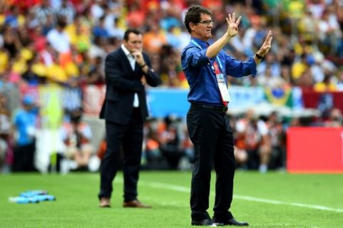 RIO DE JANEIRO, BRAZIL - JUNE 22:  Head coach Fabio Capello of Russia gestures during the 2014 FIFA World Cup Brazil Group H match between Belgium and Russia at Maracana on June 22, 2014 in Rio de Janeiro, Brazil.  (Photo by Shaun Botterill - FIFA/FIFA via Getty Images)