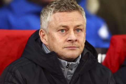Manchester United manager Ole Gunnar Solskjaer looks on during the Europa League group L soccer match between Manchester United and AZ Alkmaar at Old Trafford in Manchester, England, Thursday, Dec. 12, 2019. (AP Photo/Dave Thompson)