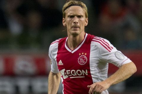 Ajax player Christian Poulsen during the national soccer league game against Twente at ArenA stadium in Amsterdam, Netherlands, Saturday Sept. 29, 2012. (AP Photo/Peter Dejong)