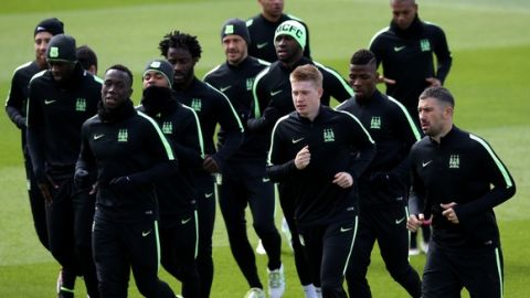 "MANCHESTER, ENGLAND - MAY 03:  The Manchester City team warm up during a training session ahead of the UEFA Champions League Semi Final Second Leg match between Real Madrid and Manchester City at the Academy Training Ground on May 3, 2016 in Manchester, England.  (Photo by Jan Kruger/Getty Images)"