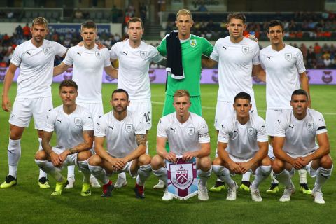 Burnley's players pose for photographs prior to a Europa League qualification soccer match between Istanbul Basaksehir and Burnley, at the Fatih Terim stadium in Istanbul, Thursday, Aug. 9, 2018. (AP Photo)