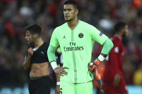PSG's goalkeeper Alphonse Areola leaves the pitch after the Champions League Group C soccer match between Liverpool and Paris-Saint-Germain at Anfield stadium in Liverpool, England, Tuesday, Sept. 18, 2018. Liverpool won the match 3-2. (AP Photo/Dave Thompson)