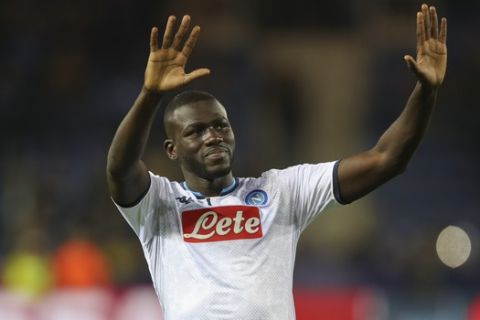 Napoli's Kalidou Koulibaly gestures to supporters at the end of the Champions League group E soccer match between Genk and Napoli at the KRC Genk Arena in Genk, Belgium, Wednesday, Oct. 2, 2019. (AP Photo/Francisco Seco)