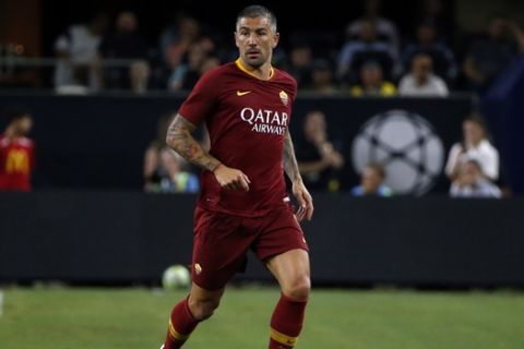 Roma defender Aleksandar Kolarov (11) dribbles the ball against Barcelona during the second half during the 2018 International Champions Cup soccer game in Arlington, Texas, Tuesday, July 31, 2018. Roma defeated Barcelona 4-2. (AP Photo/Michael Ainsworth)