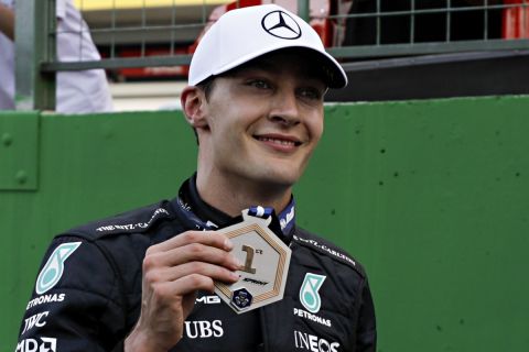Mercedes driver George Russell, of Britain, celebrates winning the Sprint Race qualifying session at the Interlagos racetrack, in Sao Paulo, Brazil, Saturday, Nov. 12, 2022. The Brazilian Formula One Grand Prix will take place on Sunday. (AP Photo/Marcelo Chello)
