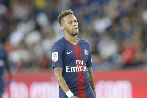 PSG's Neymar reacts during their League One soccer match between Paris Saint-Germain and Caen at Parc des Princes stadium in Paris, Sunday, Aug. 12, 2018. (AP Photo/Michel Euler)