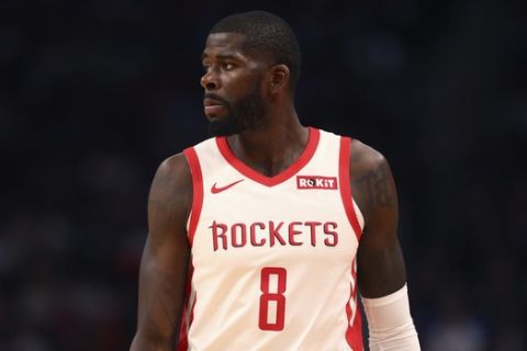 Houston Rockets forward James Ennis III walks up court during the second half of an NBA basketball game against the Detroit Pistons, Friday, Nov. 23, 2018, in Detroit. (AP Photo/Carlos Osorio)