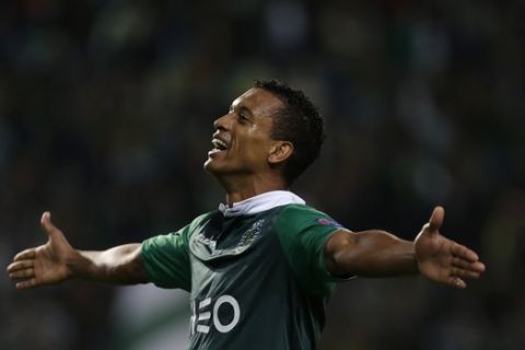 Sporting's Nani, celebrates after scoring during a Champions League Group G soccer match between Sporting and Maribor at Sporting's Alvalade stadium, in Lisbon, Tuesday, Nov. 25, 2014. (AP Photo/Francisco Seco) 