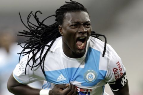 Marseille's forward Bafetimbi Gomis, reacts after scoring, during the League One soccer match between Marseille and Montpellier, at the Velodrome Stadium, in Marseille, southern France, Friday, Jan.27, 2017. (AP Photo/Claude Paris)