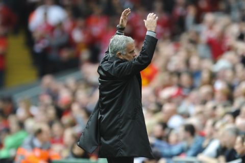 Manchester United coach Jose Mourinho reacts on the sidelines during the English Premier League soccer match between Liverpool and Manchester United at Anfield, Liverpool, England, Saturday, Oct. 14, 2017. (AP Photo/Rui Vieira)