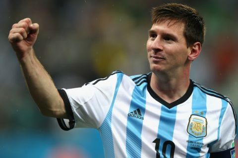 SAO PAULO, BRAZIL - JULY 09:  Lionel Messi of Argentina celebrates defeating the Netherlands in a shootout during the 2014 FIFA World Cup Brazil Semi Final match between the Netherlands and Argentina at Arena de Sao Paulo on July 9, 2014 in Sao Paulo, Brazil.  (Photo by Clive Rose/Getty Images)