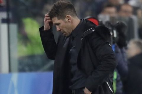 Atletico coach Diego Simeone reacts during the Champions League round of 16, 2nd leg, soccer match between Juventus and Atletico Madrid at the Allianz stadium in Turin, Italy, Tuesday, March 12, 2019. (AP Photo/Luca Bruno)