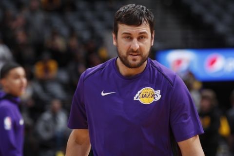 Los Angeles Lakers center Andrew Bogut (66) in the first half of an NBA basketball game Saturday, Dec. 2, 2017, in Denver. (AP Photo/David Zalubowski)