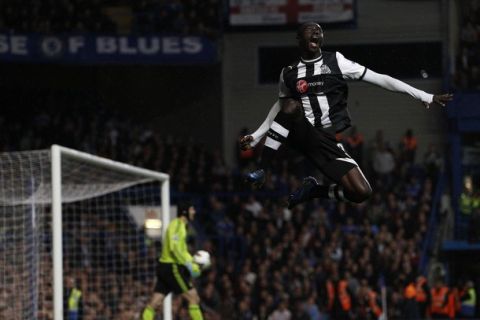 Newcastle United's Papiss Cisse celebrates after scoring against Chelsea during their English Premier League soccer match at Stamford Bridge in London May 2, 2012. REUTERS/Stefan Wermuth (BRITAIN - Tags: SPORT SOCCER TPX IMAGES OF THE DAY) NO USE WITH UNAUTHORIZED AUDIO, VIDEO, DATA, FIXTURE LISTS, CLUB/LEAGUE LOGOS OR "LIVE" SERVICES. ONLINE IN-MATCH USE LIMITED TO 45 IMAGES, NO VIDEO EMULATION. NO USE IN BETTING, GAMES OR SINGLE CLUB/LEAGUE/PLAYER PUBLICATIONS. FOR EDITORIAL USE ONLY. NOT FOR SALE FOR MARKETING OR ADVERTISING CAMPAIGNS