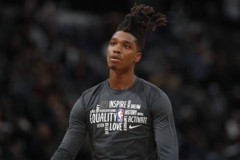 San Antonio Spurs guard Lonnie Walker IV (1) in the second half of an NBA basketball game Monday, Feb.10, 2020, in Denver. The Nuggets won 127-120. (AP Photo/David Zalubowski)