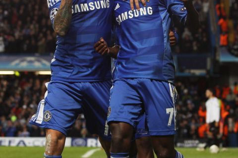 LONDON, ENGLAND - DECEMBER 06:  Ramires of Chelsea (7)  celebrates with Raul Meireles (L) as he scores their second goal during the UEFA Champions League Group E match between Chelsea FC and Valencia CF at Stamford Bridge on December 6, 2011 in London, England.  (Photo by Scott Heavey/Getty Images)