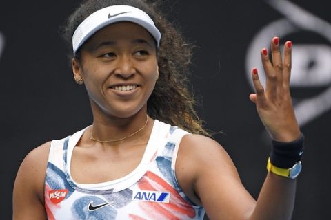 FILE - In this Wednesday, Jan. 22, 2020, file photo, Japan's Naomi Osaka reacts after defeating China's Zheng Saisai in their second round singles match at the Australian Open tennis championship in Melbourne, Australia. Osaka has been a Grand Slam champion and No. 1 in the WTA rankings and now shes No. 1 on another list: top-earning female athlete, according to a story posted on Forbes.com on Friday, May 22, 2020. (AP Photo/Andy Brownbill, File)