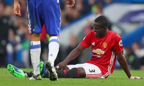 Eric Bailly of Manchester United goes down injured during the Premier League match between Chelsea and Manchester United played at Stamford Bridge, London on 23rd October 2016