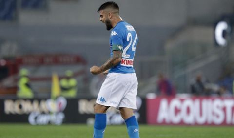 Napoli's Lorenzo Insigne celebrates his side's 1-0 over Roma, at the end of a Serie A soccer match at the Rome Olympic Stadium, Saturday, Oct. 14, 2017. (AP Photo/Andrew Medichini)