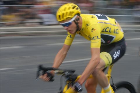 Britain's Chris Froome, wearing the overall leader's yellow jersey, rides during the twenty-first and last stage of the Tour de France cycling race over 103 kilometers (64 miles) with start in Montgeron and finish in Paris, France, Sunday, July 23, 2017. (AP Photo/Laurent Rebours)