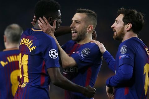 Barcelona's Ousmane Dembele, left, celebrates with Jordi Alba and Lionel Messi, right, after scoring his side's second goal during the Champions League round of sixteen second leg soccer match between FC Barcelona and Chelsea at the Camp Nou stadium in Barcelona, Spain, Wednesday, March 14, 2018. (AP Photo/Manu Fernandez)