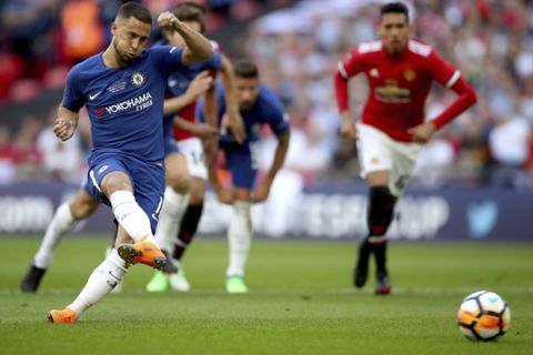 Chelsea's Eden Hazard scores from the penalty spot during the Emirates FA Cup Final against Manchester United at Wembley Stadium, Saturday, May 19, 2018, in London. (Nick Potts/PA via AP)