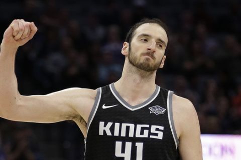 Sacramento Kings center Kosta Koufos clenches his fist after the Kings scored against the Orlando Magic during the second half of an NBA basketball game Friday, March 9, 2018, in Sacramento, Calif. The Kings won 94-88. (AP Photo/Rich Pedroncelli)