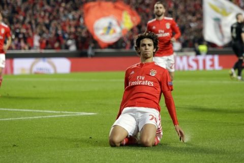 Benfica's Joao Felix celebrates after scoring his side's opening goal from the penalty spot during the Europa League quarterfinals, first leg, soccer match between Benfica and Eintracht Frankfurt at the Luz stadium in Lisbon, Thursday, April 11, 2019. (AP Photo/Armando Franca)