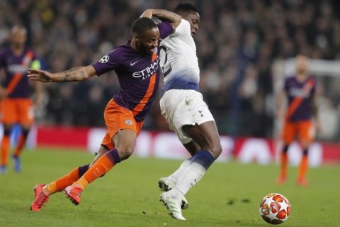Manchester City's Raheem Sterling, left, challenges for the ball with Tottenham's Victor Wanyama during the Champions League, round of 8, first-leg soccer match between Tottenham Hotspur and Manchester City at the Tottenham Hotspur stadium in London, Tuesday, April 9, 2019. (AP Photo/Frank Augstein)