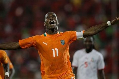 Ivory Coast's captain Didier Drogba celebrates after scoring against Equatorial Guinea in their African Cup of Nations quarter-final match at Malabo Stadium in Malabo, Equatorial Guinea, Saturday, Feb. 4, 2012. (AP Photo/Rebecca Blackwell)