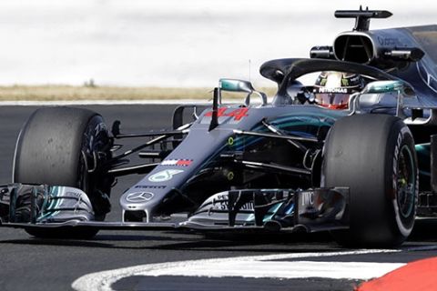 Mercedes driver Lewis Hamilton of Britain steers his car during the first free practice at the Silverstone racetrack, Silverstone, England, Friday, July 6, 2018. The British Formula One Grand Prix will be held on Sunday July 8. (AP Photo/Luca Bruno)
