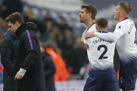 Tottenham's Fernando Llorente, center, celebrates with teammates after scoring his side's second goal during the English Premier League soccer match between Tottenham Hotspur and Watford at Wembley Stadium in London, Wednesday, Jan. 30, 2019.(AP Photo/Frank Augstein)