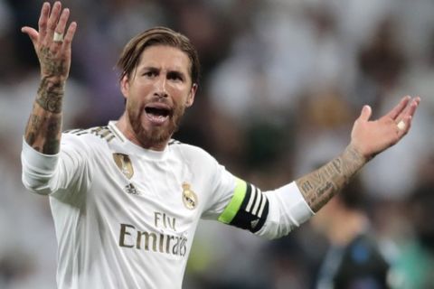 Real Madrid's Sergio Ramos reacts during the Champions League group A soccer match between Real Madrid and Club Brugge, at the Santiago Bernabeu stadium in Madrid, Tuesday, Oct. 1, 2019. (AP Photo/Bernat Armangue)