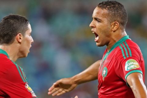 Morocco's Youssef El Arabi, right, reacts with a teammate after scoring against Cape Verde during the Africa Cup of Nations game at the Moses Mabhida Stadium in Durban, South Africa, Wednesday, Jan. 23, 2013. (AP Photo/Schalk van Zuydam)