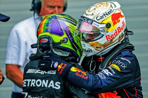 BUDAPEST, HUNGARY - JULY 31: Lewis Hamilton of Mercedes and Great Britain congratulates Max Verstappen of Red Bull Racing and The Netherlands on finishing in first position during the F1 Grand Prix of Hungary at Hungaroring on July 31, 2022 in Budapest, Hungary. (Photo by Peter Fox/Getty Images)