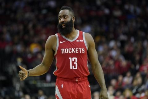 Houston Rockets' James Harden (13) gives a thumbs up against the Golden State Warriors during the second half of an NBA basketball game Thursday, Nov. 15, 2018, in Houston. (AP Photo/David J. Phillip)