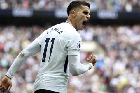 Tottenham Hotspur's Erik Lamela celebrates scoring his side's forth goal, during the English Premier League soccer match between Tottenham Hotspur and Leicester City, at Wembley Stadium, in London, Sunday May 13, 2018. (Steven Paston/PA via AP)