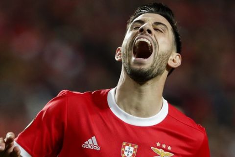 Benfica's Pizzi reacts after a missed chance to score during the Europa League round of 32 second leg soccer match between SL Benfica and Shakhtar Donetsk at the Luz stadium in Lisbon, Thursday, Feb. 27, 2020. (AP Photo/Armando Franca)
